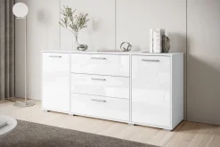 Komody></noscript>BRATEX Biała komoda z szufladami do salonu 150 cm BUENO połysk biały