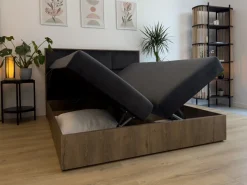 Łóżka Małżeńskie|Łóżka Ze Stelażem></noscript>BROMARKT Dwuosobowe łóżko kontynentalne 180x200 cm z pojemnikiem na pościel LOFT dąb lefkas