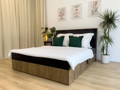 Łóżka Małżeńskie|Łóżka Ze Stelażem></noscript>BROMARKT Dwuosobowe łóżko kontynentalne 180x200 cm z pojemnikiem na pościel LOFT dąb lefkas